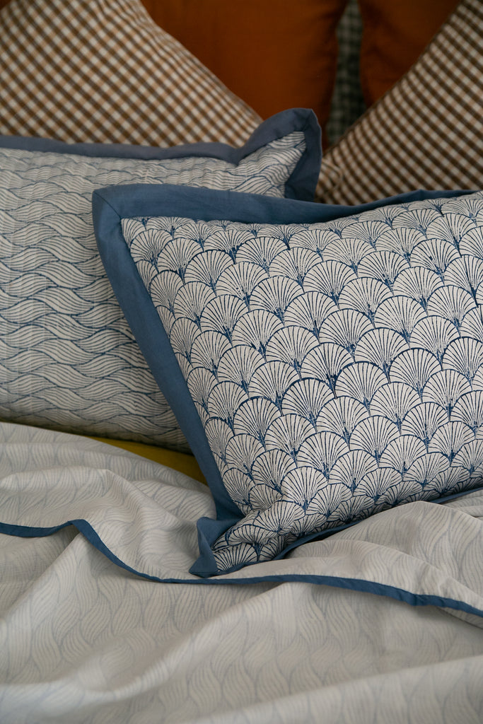 Detail of a block printed cushion in a Japanese sunrise design