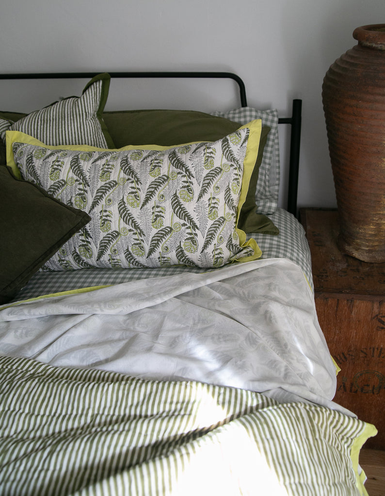 block printed bedlinen on a bed 