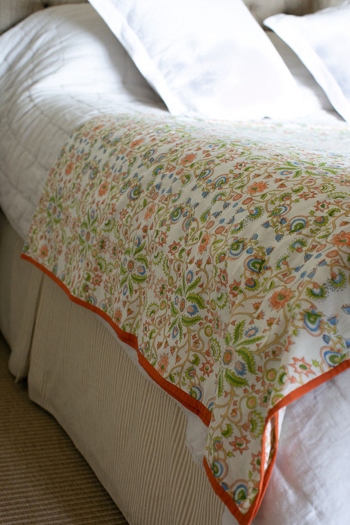 detail of a block printed dohar on a bed