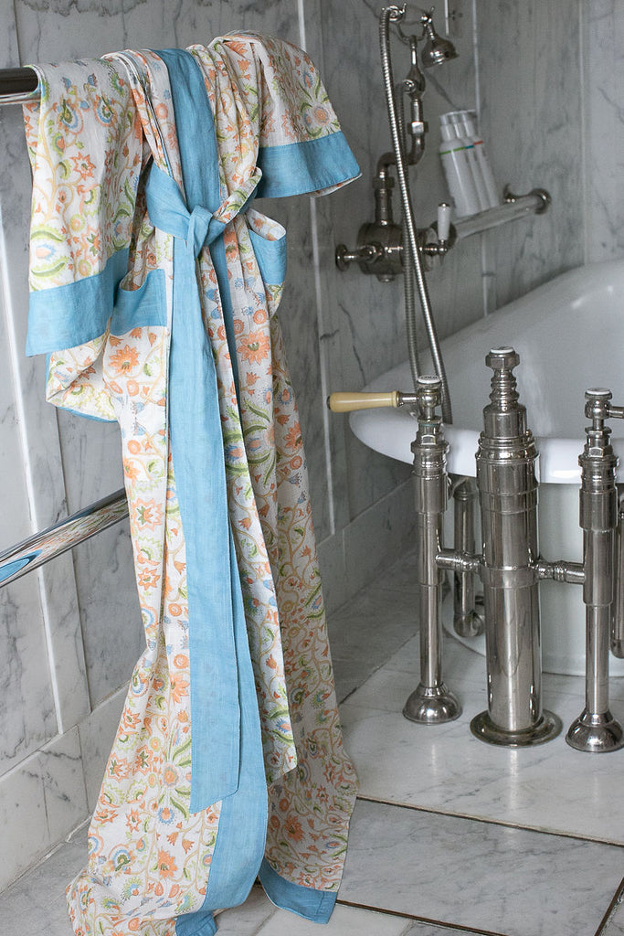 sky blue kimono robe on a towel rail 