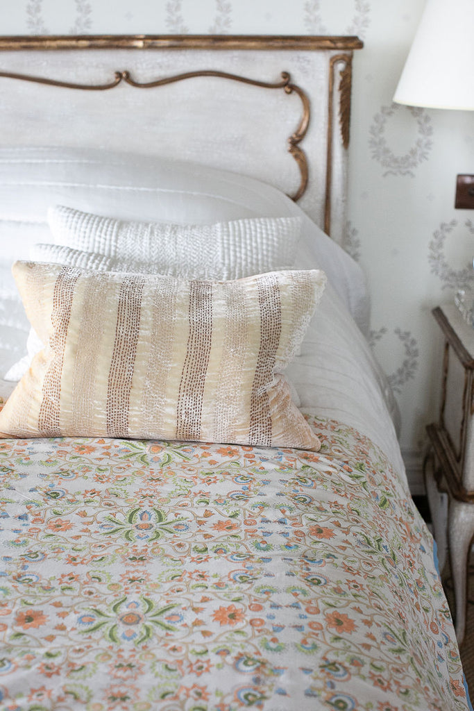 a block printed dohar on a bed 