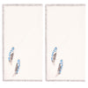 close up of two napkins that are block printed with feathers 