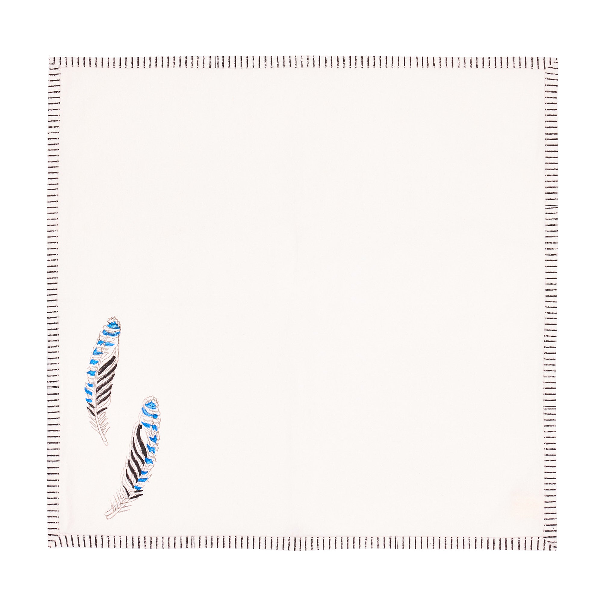 a block printed napkin with a feather motif