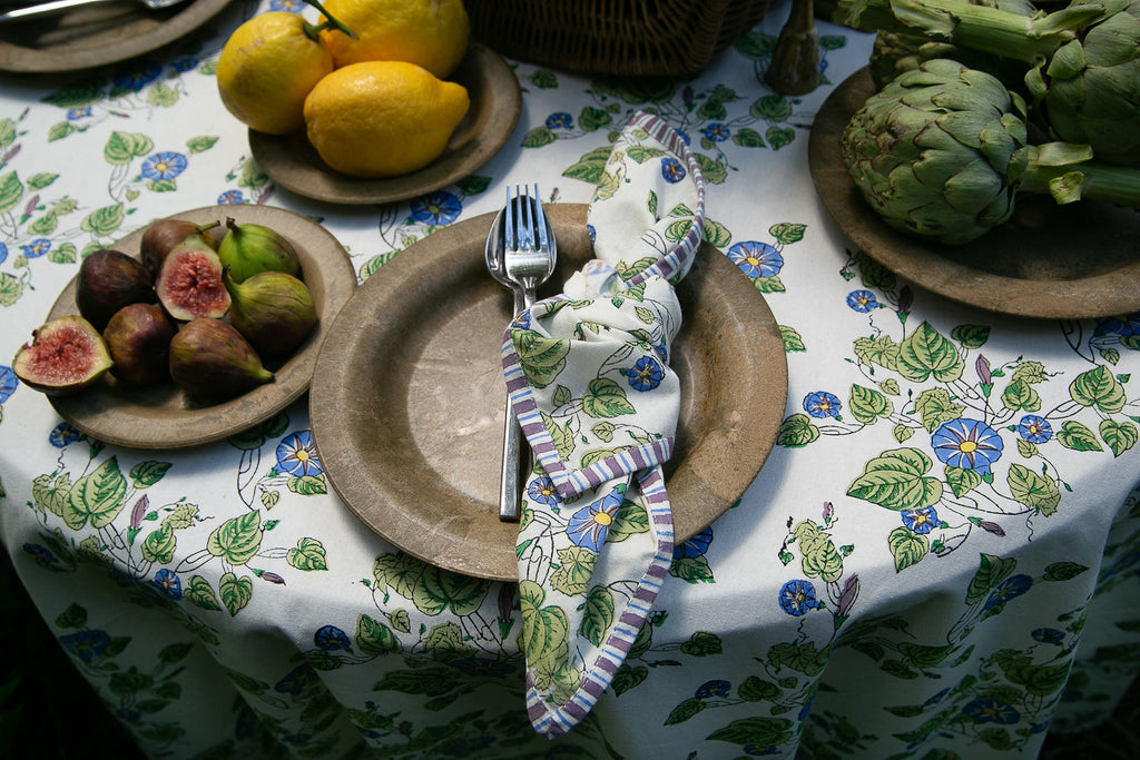 block printed napkin on a round textured plate 