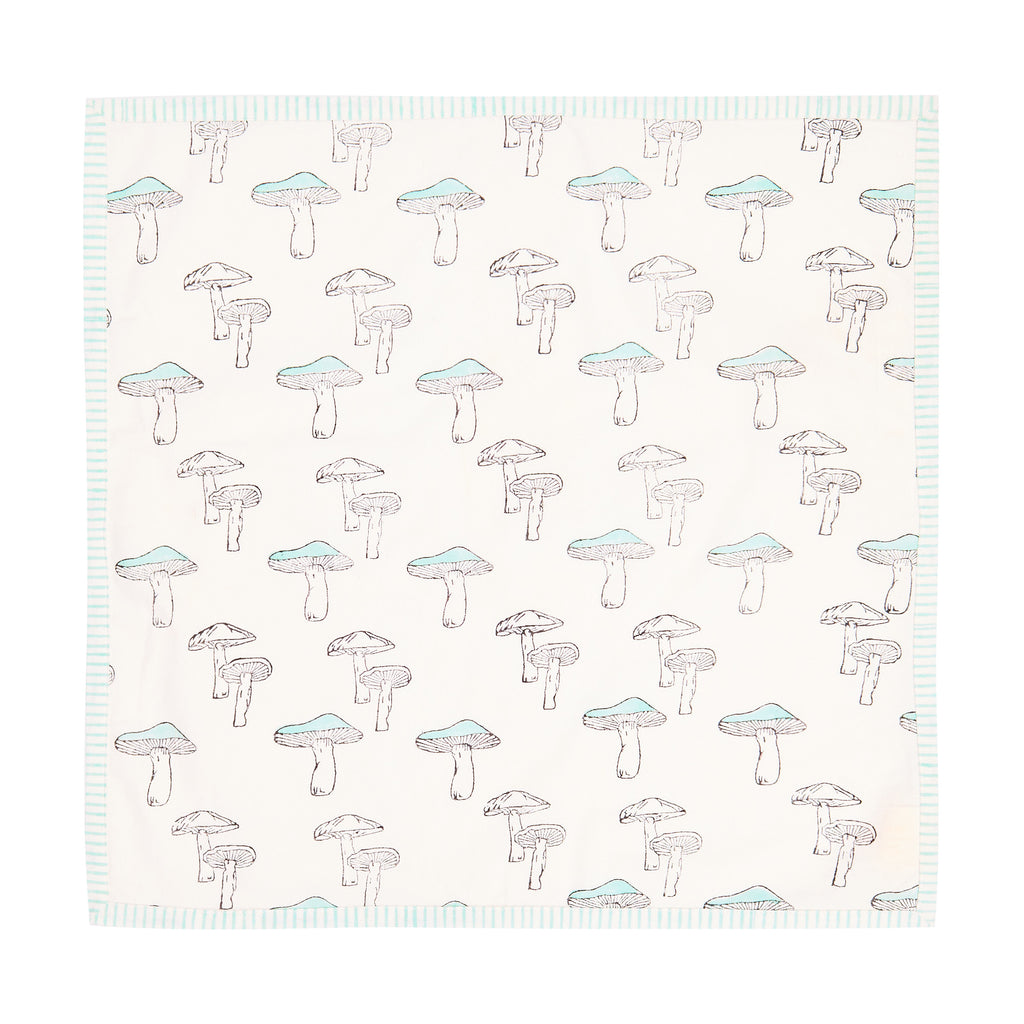 bird's eye view of a mushroom motif napkin