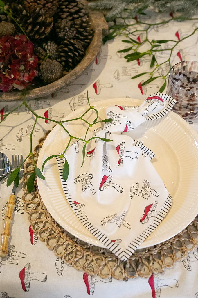 block printed napkin and tablecloth in a mushroom motif