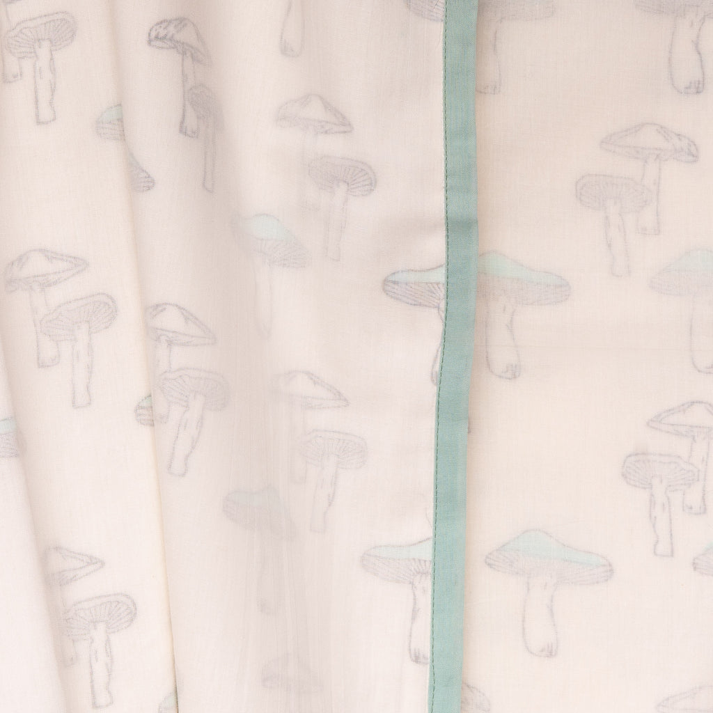 detail of a mushroom print on a cotton dohar